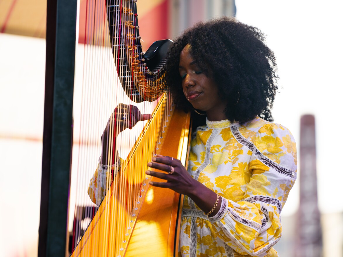 Harpist Brandee Younger performs at the Transit Pier at the DC JazzFest in Washington, D.C.