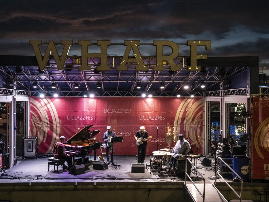 Gerald Clayton (from left), Gregory Tardy, Bill Frisell and Johnathan Blake, of the Bill Frisell Four, perform at the Transit Pier at the DC JazzFest in Washington, D.C.